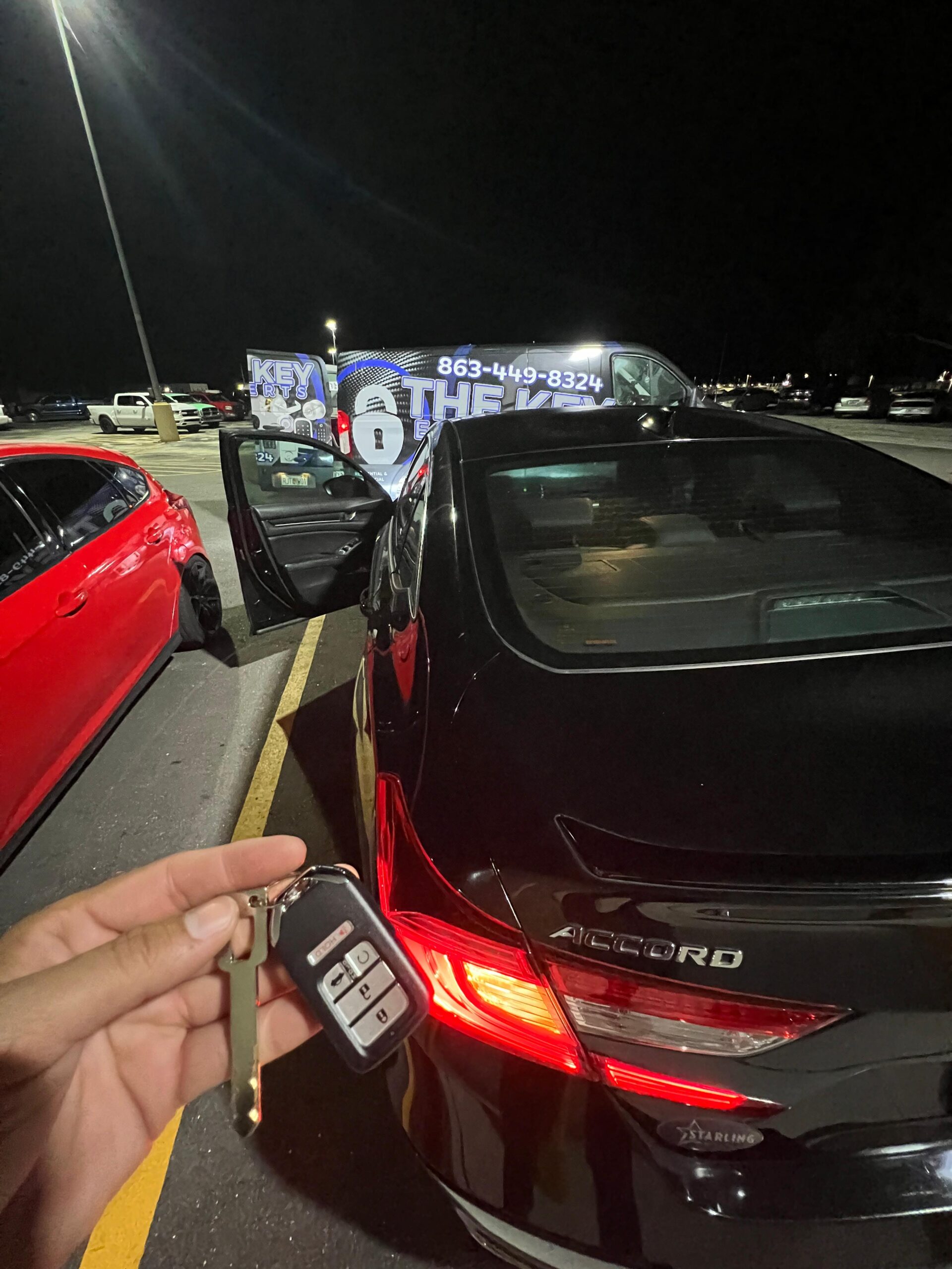 Mobile locksmith at a vehicle in Winter Haven, Florida